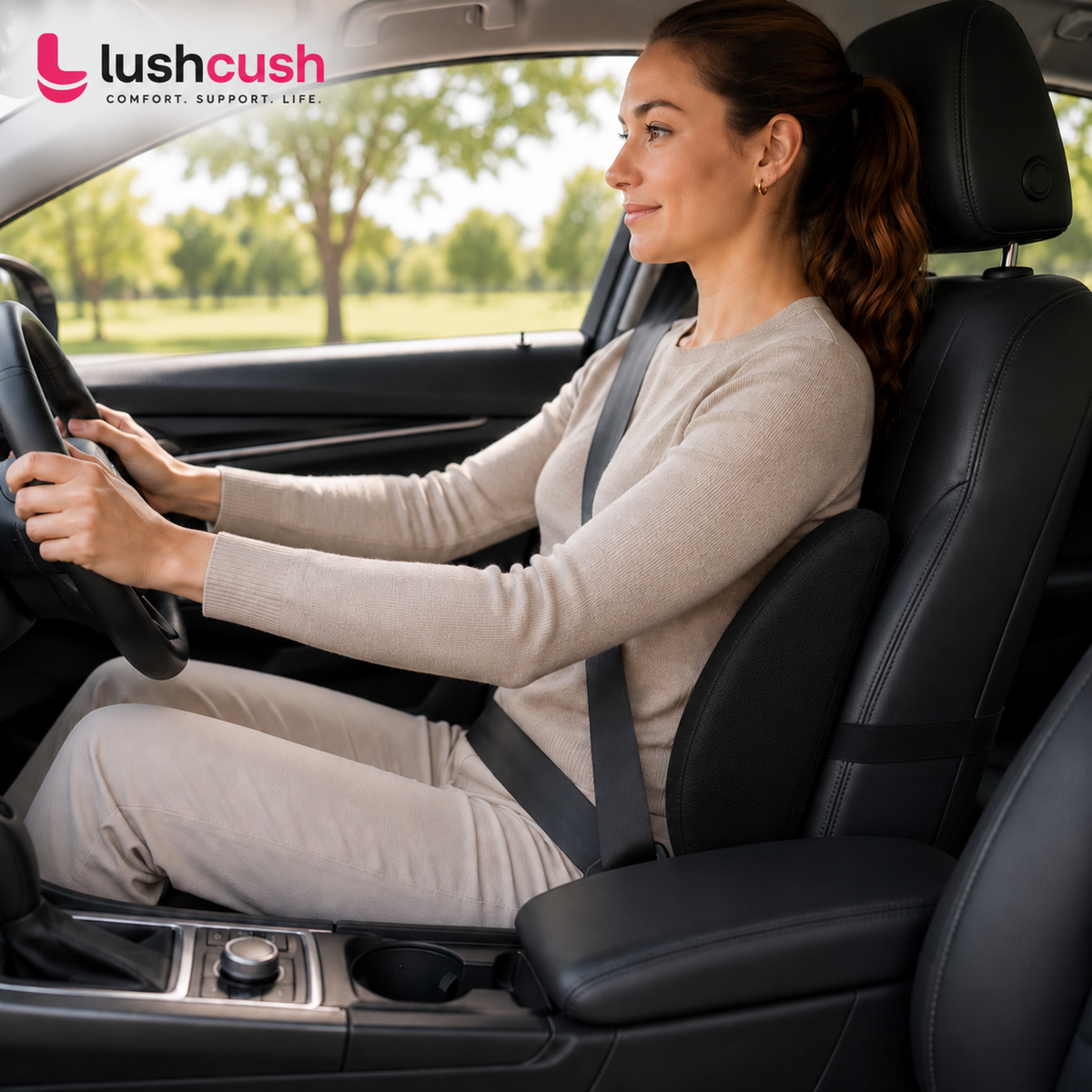 LushCush ergonomic back support pillow being used in a car