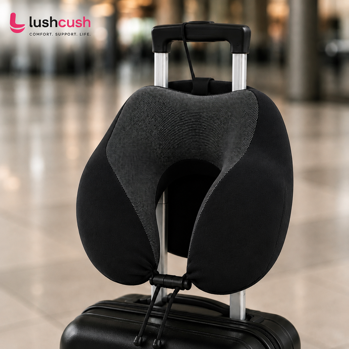 LushCush neck support pillow attached to travel luggage